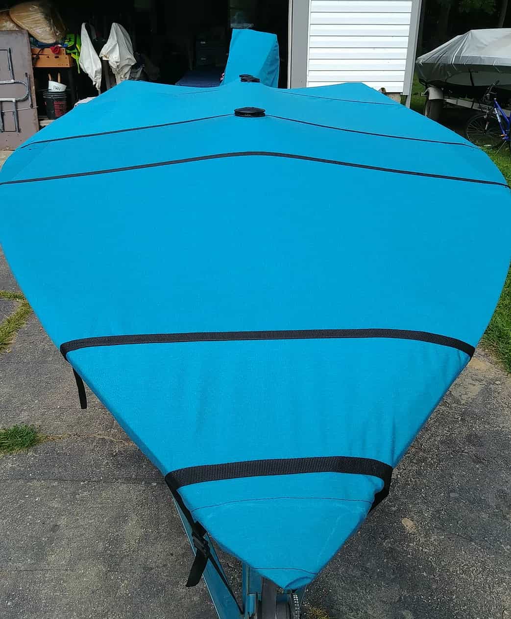 Durable blue boat cover custom fitted by McCalla Sewing brand experts in Stockbridge Michigan